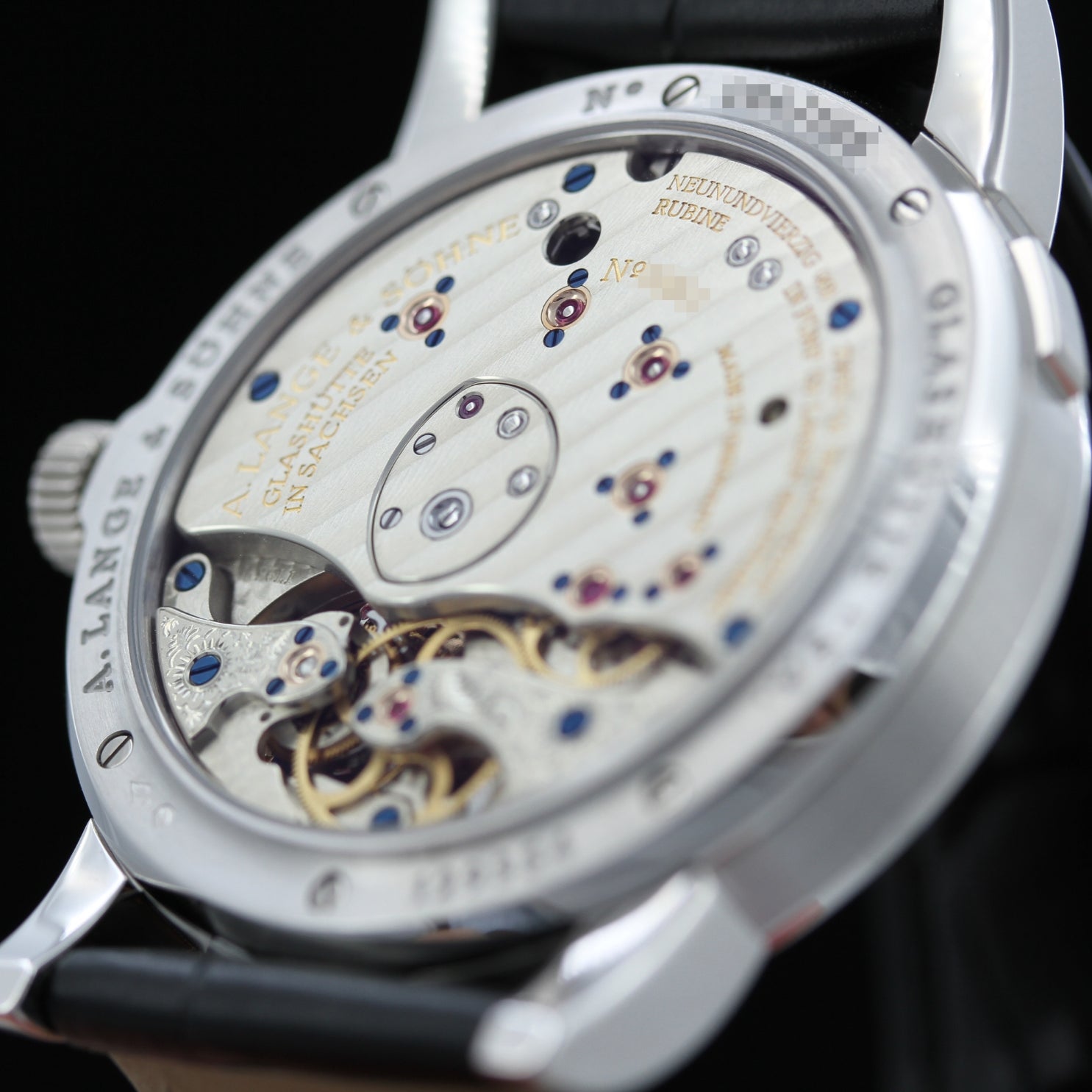 A. Lange & Söhne Lange 1 in Platin, Tourbillon, Limited 1XX of 150, Ref. 704.025, ALS-Service 08-2023, Box+Papiere - LUXUHRIA